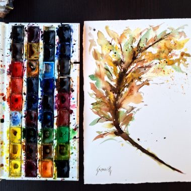 ציור מקורי: פלטה צבעים פתוחה מונחת לצד גיליון שעליו ציור פרחים מופשט — ענף עלים רופף בגווני אדמה — המבטא את הקסם של אמנות קיר בוטנית, כפי שנראה ב-il_fullxfull.6408452877_bidd.jpg. מוסיף צבע וייחודיות לכל חלל.